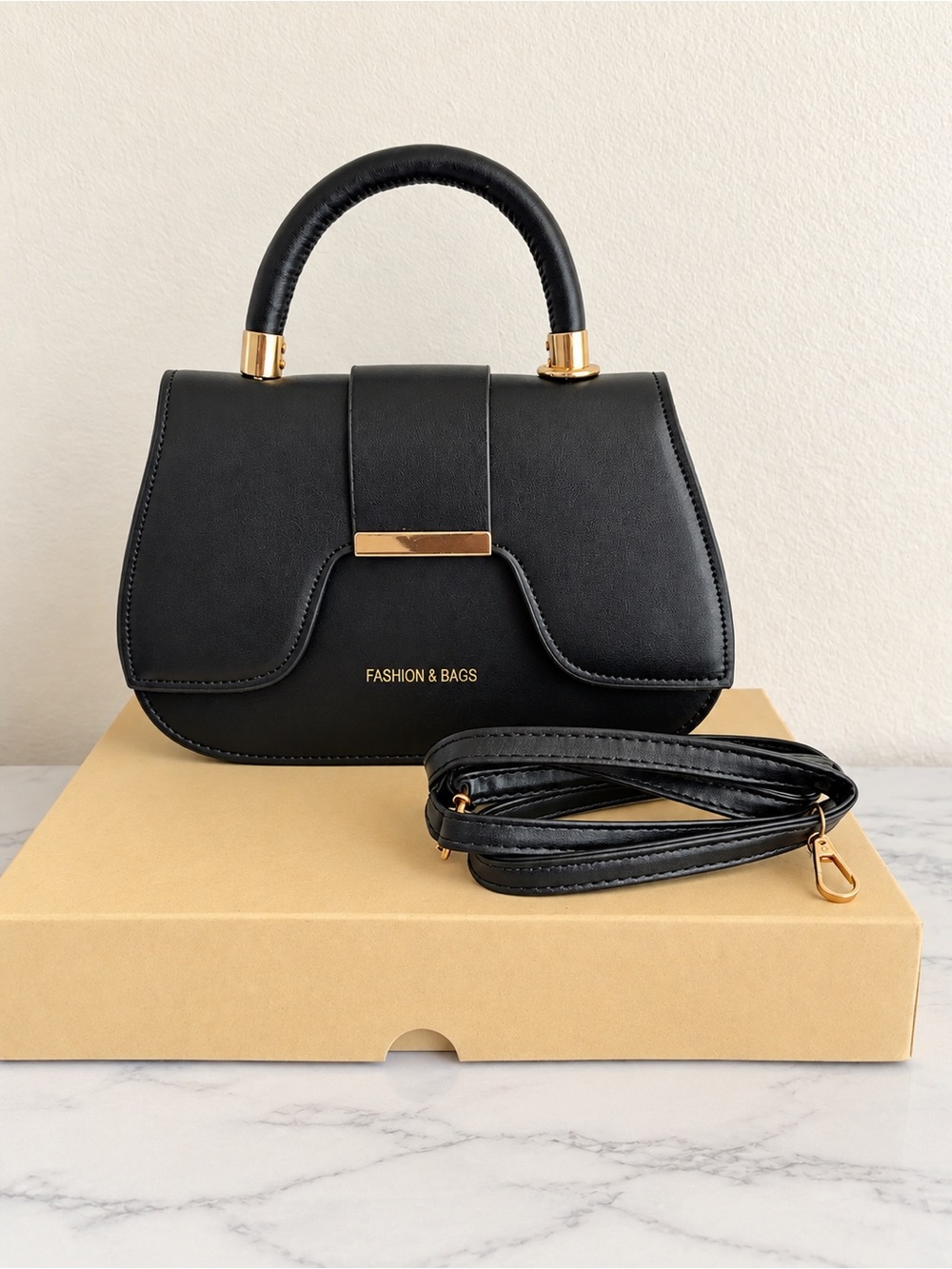 Black Top-Handle Women's Handbag with Gold Accents